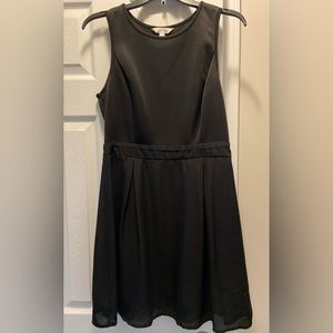 Charming Charlie’s little black dress with scalloped back. Size Medium